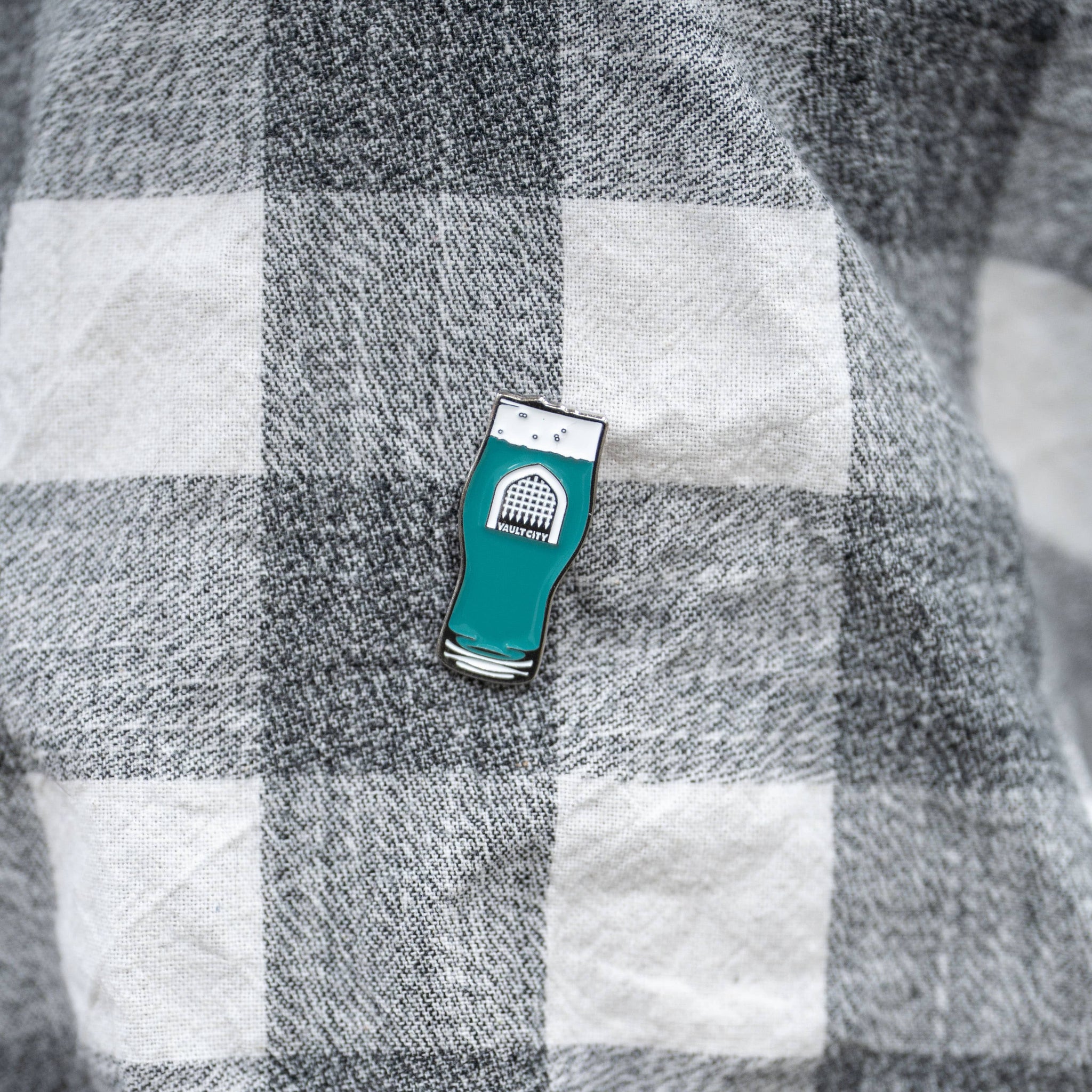 Vault City Blue Pint Pin Badge