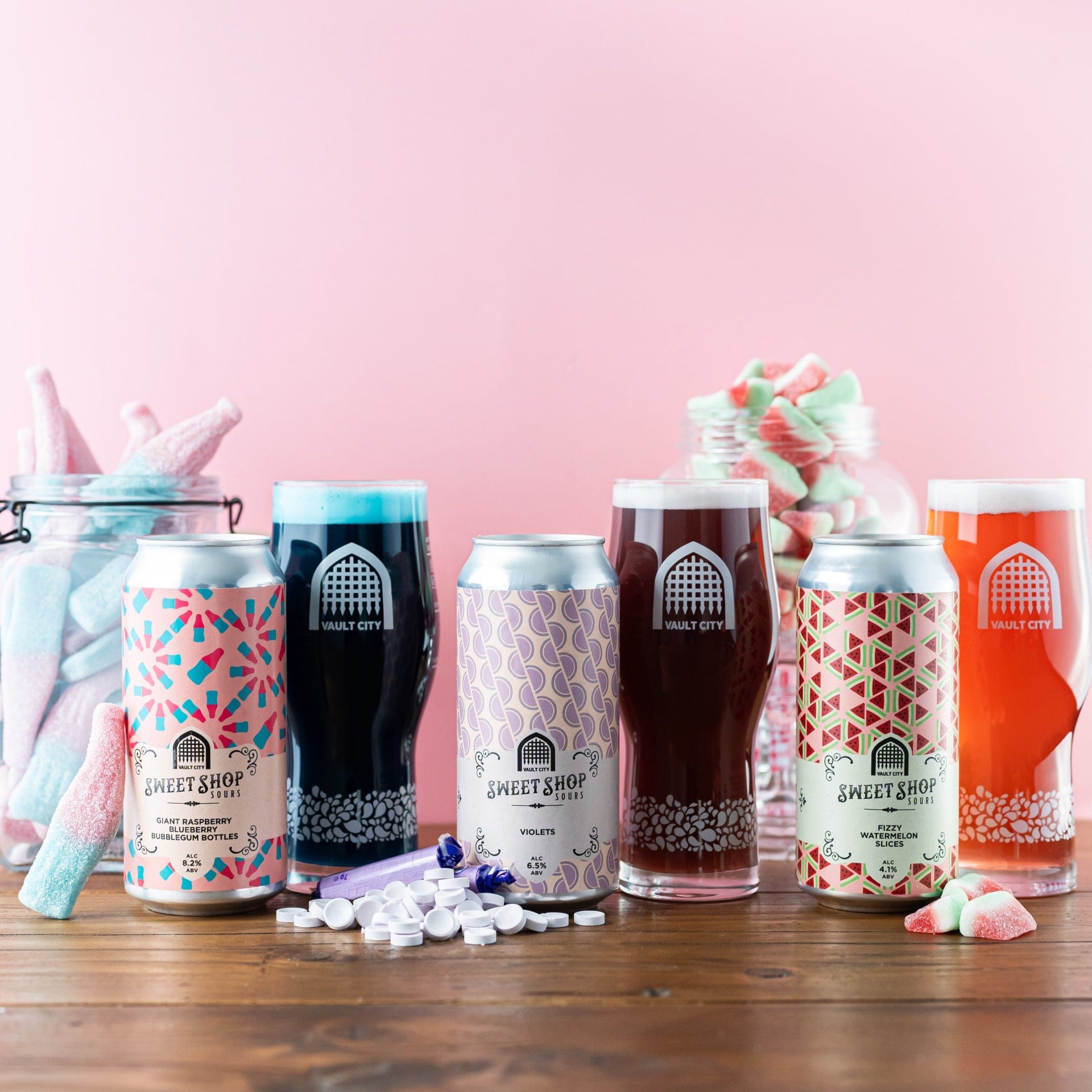 "Sweet Shop Sours Trio Bundle with Watermelon Slices, Violets & Giant Raspberry Blueberry Bubblegum Bottles in cans and glasses"